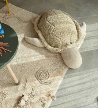 Sedací vaky a pufy /  dizajnovy-detsky-puf-korytnacka-lovel.webp 